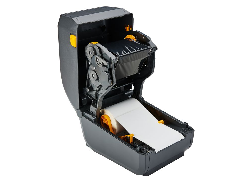 Stampante Zebra ZD230t aperta con nastro e rotolo di etichette inseriti