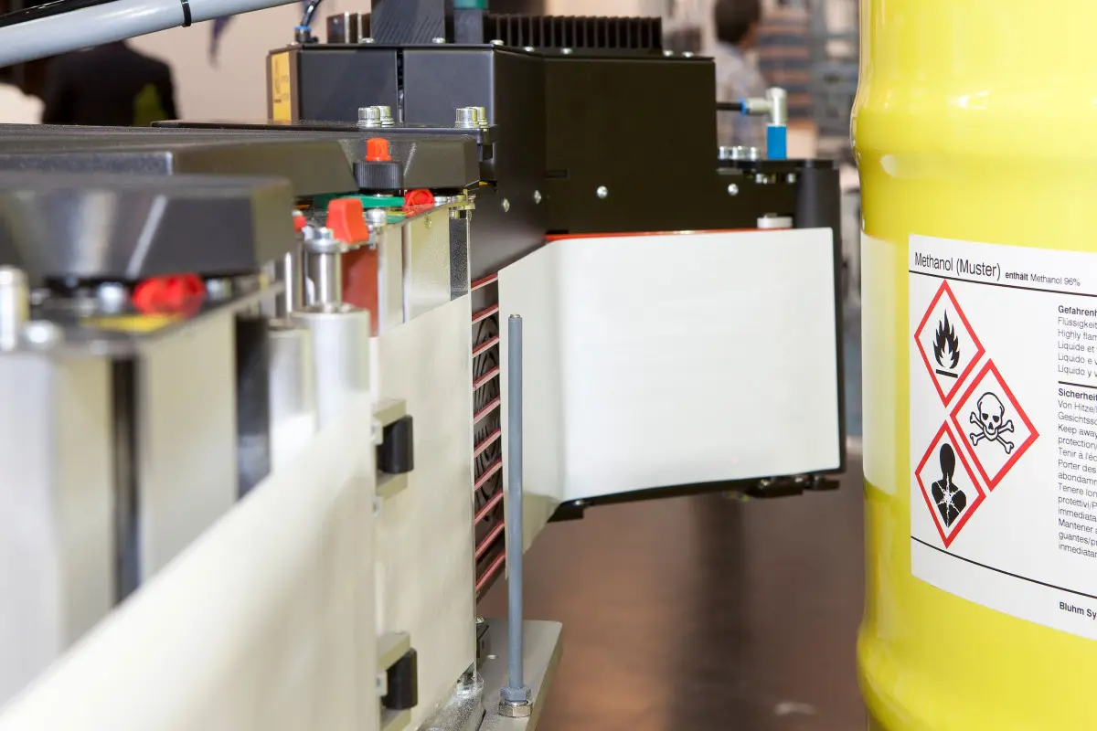 Industrial labelling of metal drums