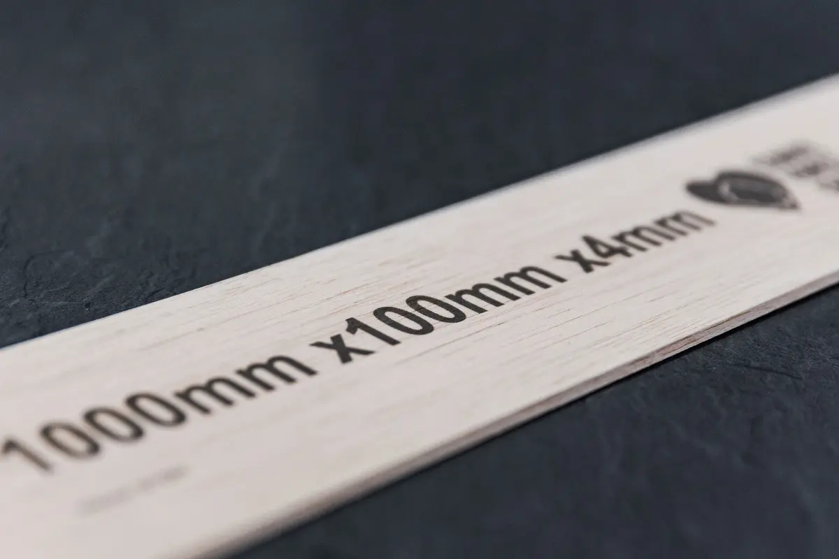 Large character printing on wooden strip